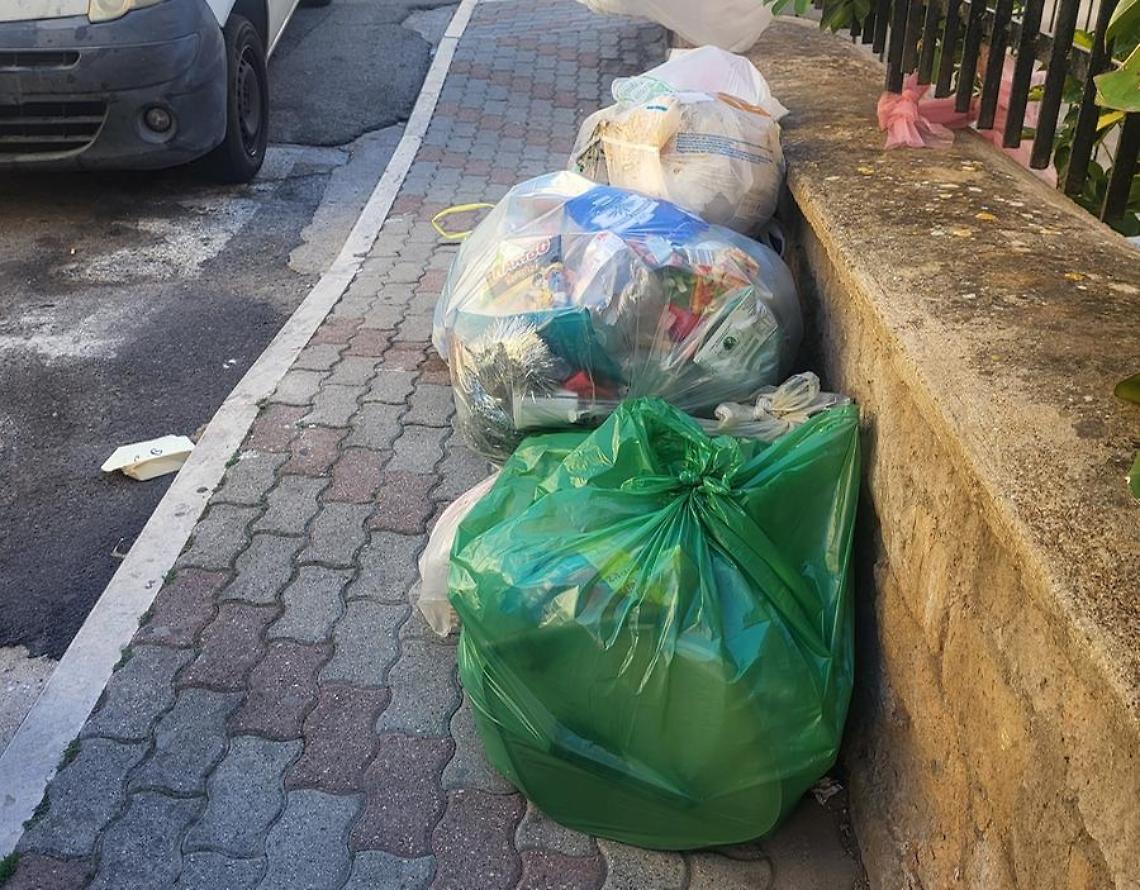 Città sommersa dai rifiuti
